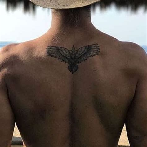 men back tattoo ideas|simple back tattoos for men.